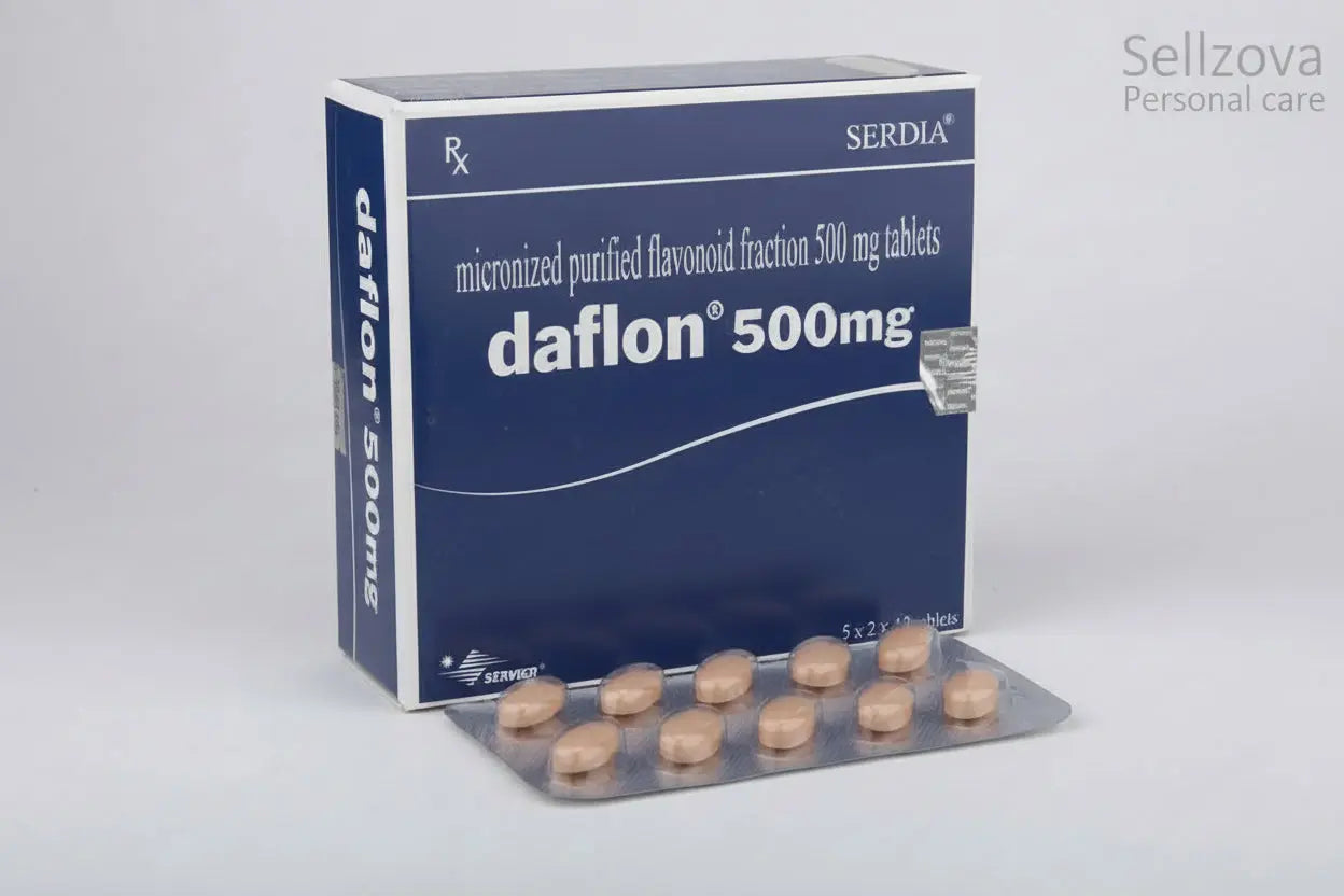 Box of daflon 500mg tablets with pills on a white background